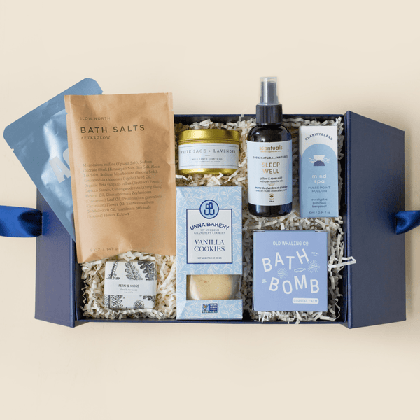 Rest and Recharge self-care gift box with essential oils, bath salts, and sheet mask in a blue Unboxme gift box