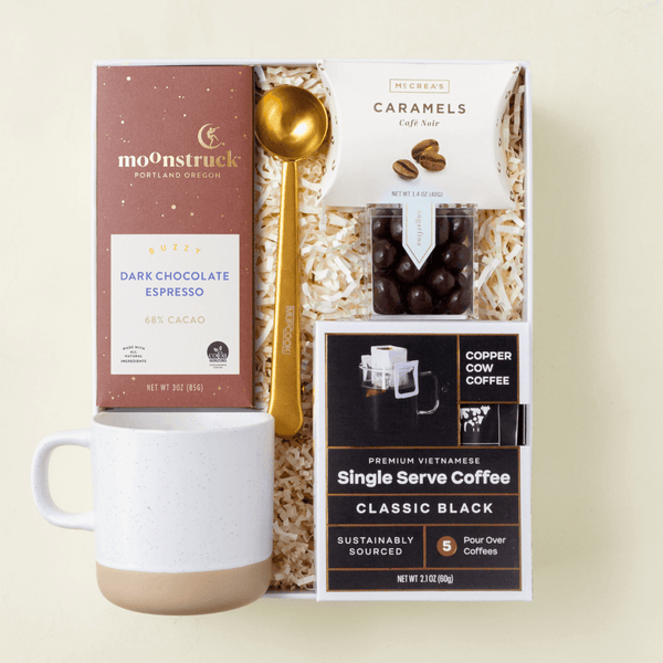 But First Coffee gift box with Vietnamese pour-over coffee, ceramic mug, and treats in a blue Unboxme gift box