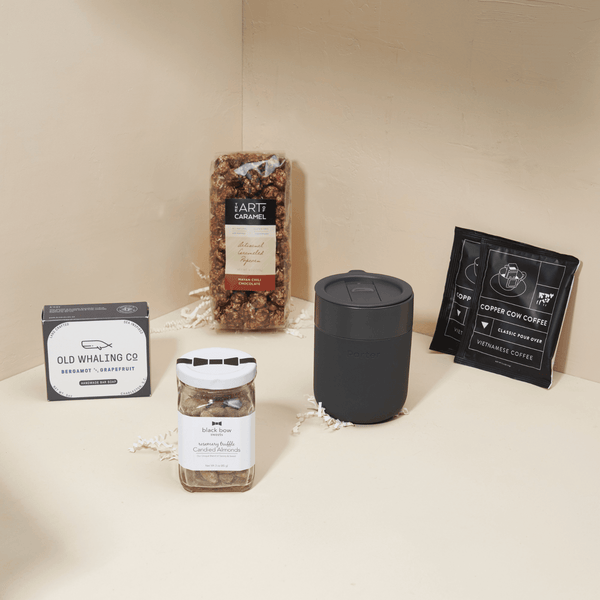 The Gentleman gift box for him with candied almonds, chocolate popcorn, and pour-over coffee in a blue Unboxme gift box