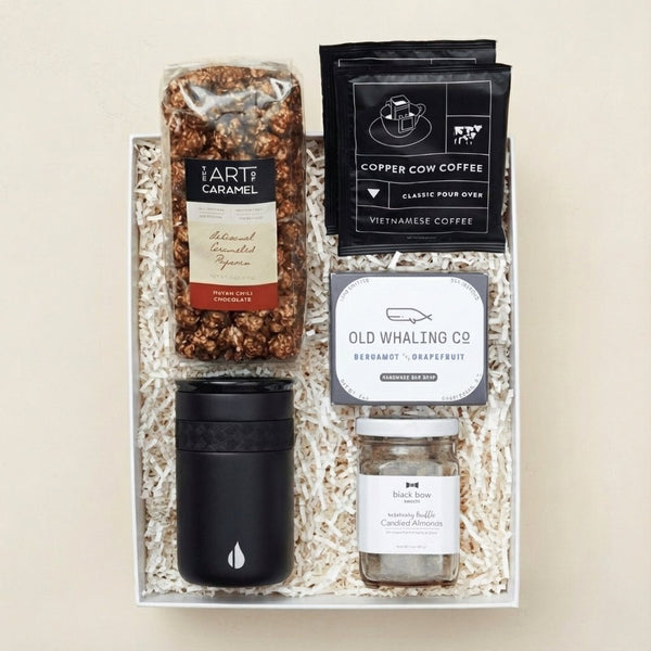 The Gentleman gift box for him with candied almonds, chocolate popcorn, and pour-over coffee in a blue Unboxme gift box