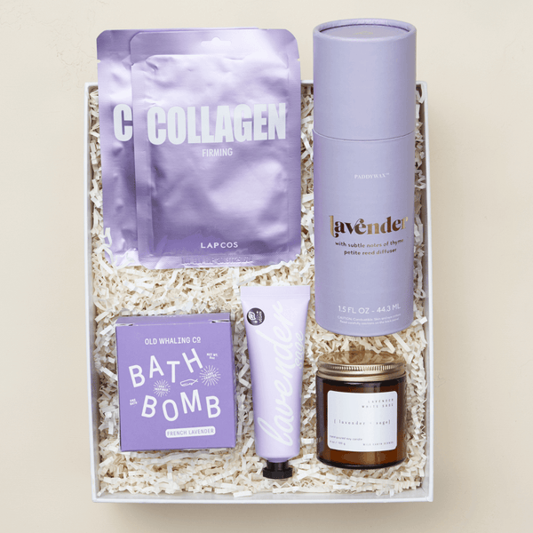 Lavender Dreams self-care gift box with essential oil diffuser, lavender candle, and hand cream in a pink Unboxme gift box