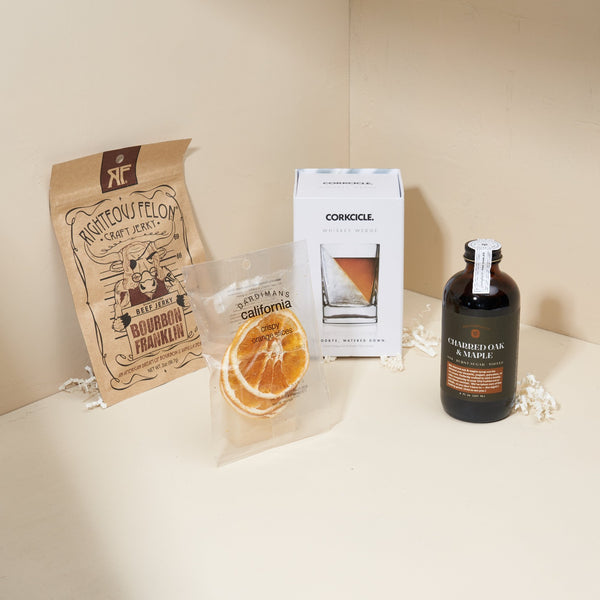 On the Rocks cocktail gift box with old fashioned kit and gourmet snacks in a blue Unboxme gift box