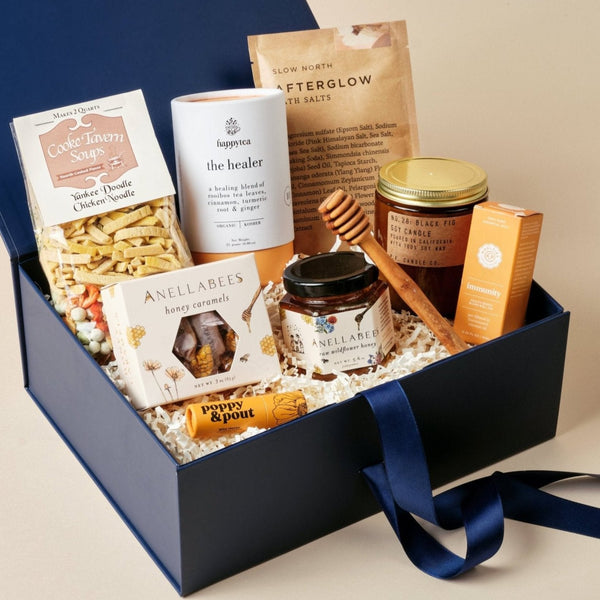 Deluxe get well gift box with immunity roller, chicken soup mix, honey, and herbal tea in an Unboxme gift box