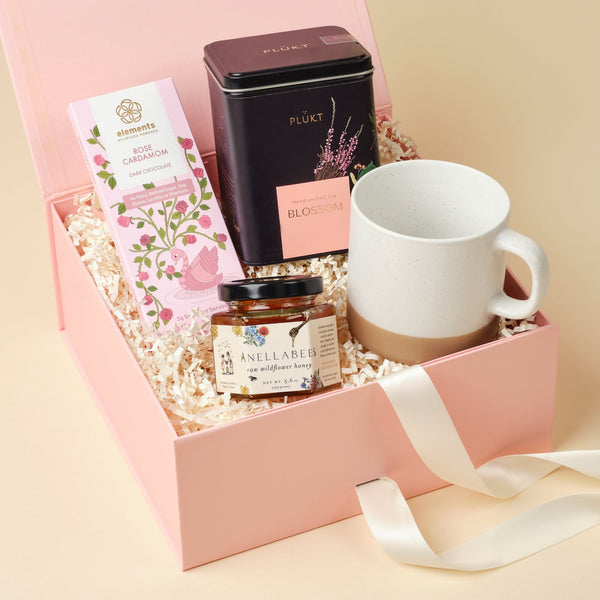 In Bloom Mini floral gift box with botanicals, honey, handcrafted mug, and chocolate in an Unboxme gift box