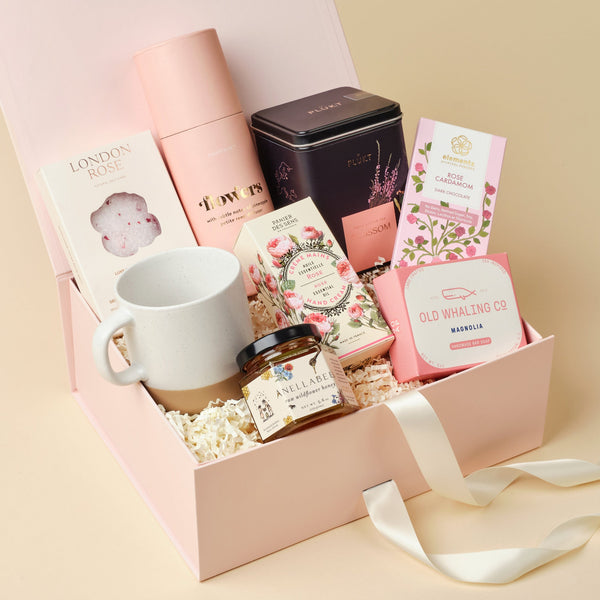 In Bloom Deluxe floral gift box with botanicals, honey, mug, chocolate, and more in an Unboxme gift box