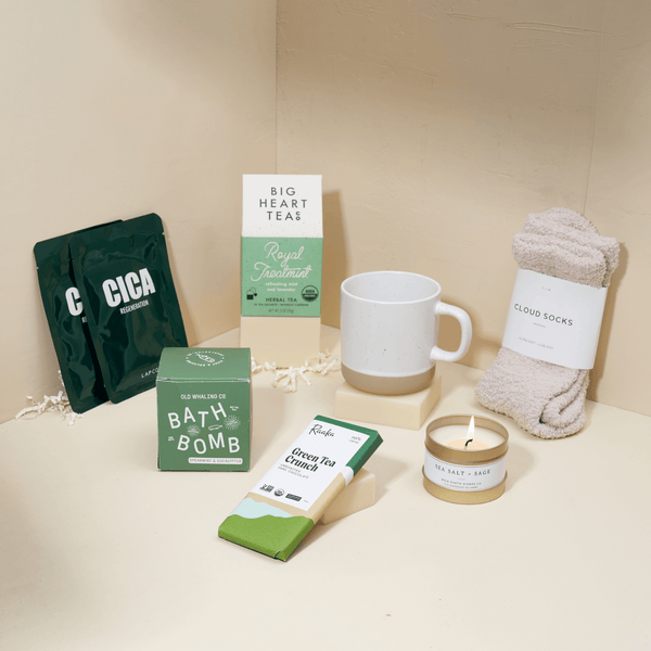 Royal Treatment luxury self-care gift box with sheet masks, bath bombs, candle, and treats in a blue Unboxme gift box